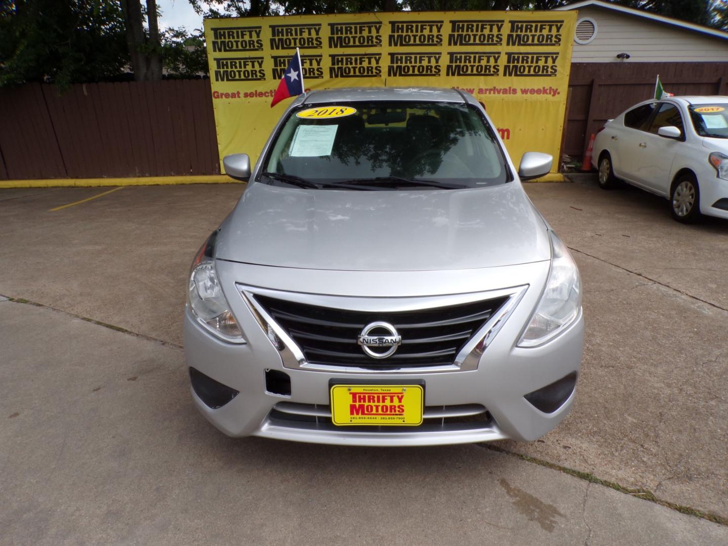 2018 Silver /Gray Nissan Versa (3N1CN7AP9JK) , Automatic transmission, located at 16710 Clay Rd., Houston, TX, 77084, (281) 859-7900, 29.834864, -95.656166 - Photo#0